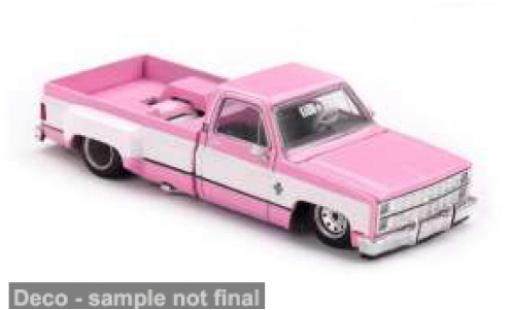 Modelauto Chevrolet Silverado pickup Dually Vintage Spec V2 roze/wit 1980 1/64 Mini GT