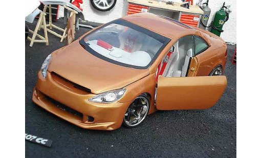 Peugeot 307 CC 1/18 Solido oranje modelauto
