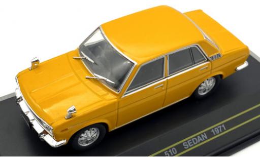 Modelauto Datsun 510 Sedan geel RHD 1971 1/43 First 43 Models