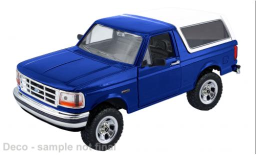 Modelauto Ford Bronco Wagon blauw/wit 1993 1/24 Motormax