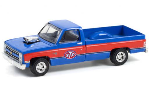 Modelauto Chevrolet Silverado pickup Custom STP 1987 1/64 Greenlight