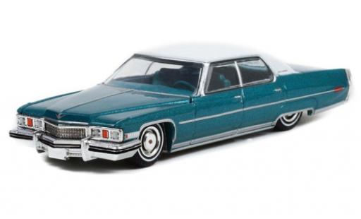 Modelauto Cadillac Sedan Sedan DeVille Lowrider metallic turquoise/wit 1973 1/64 Greenlight
