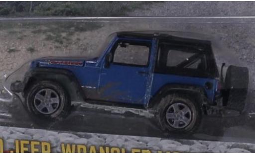 Modelauto Jeep Wrangler Mountain blauw/mat-zwart 2010 Edition avec Schmutz-Effekt 1/64 Greenlight