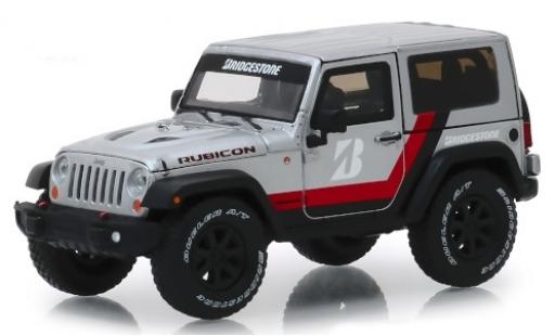 Modelauto Jeep Wrangler Rubicon grijs/Dekor Bridgestone 2014 1/43 Greenlight