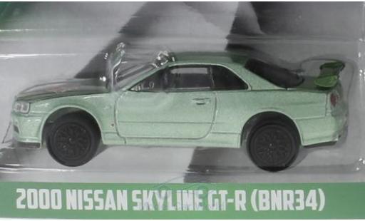 Modelauto Nissan Skyline R34 GT-R (BNR34) metallic groen Turtle Wax 2000 1/64 Greenlight