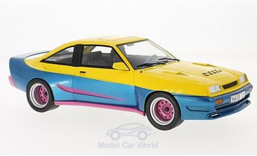 Modelauto Opel Manta B B matig geel/blauw 1991 1/18 MCG