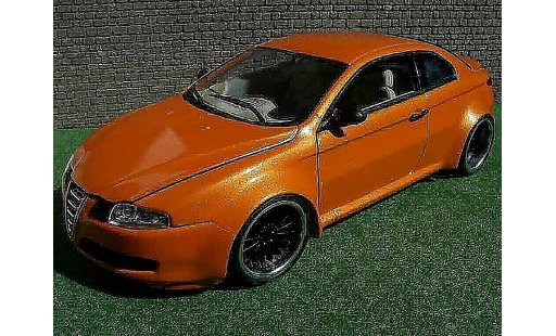 Alfa Romeo GT coupe 1/18 Welly kit large oranje mecanique mtk18 modelauto