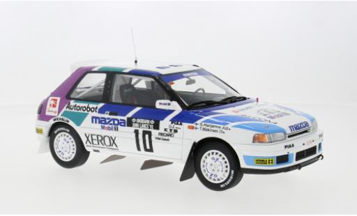 Modelauto Mazda 323 GTX 1000 Lakes Rally 1991 #10 1/18 Ottomobile