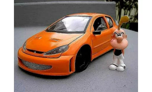 Peugeot 206 WRC 1/18 Solido street racing oranje modelauto