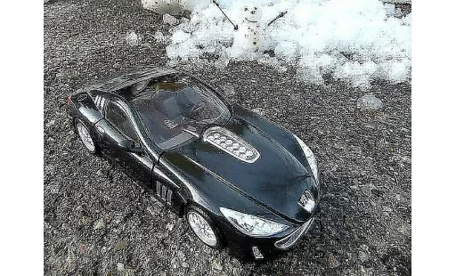 Peugeot 907 Concept 1/18 Burago car 2004 modelauto