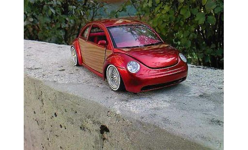 Volkswagen New Beetle Base 1/18 Burago low rider modelauto