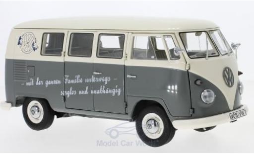 Modelauto Volkswagen T1 B Bus met Slogan: met der ganzen Familien unterwegs-sorglos en unabh&Atilde;&curren;ngig 1/18 Schuco