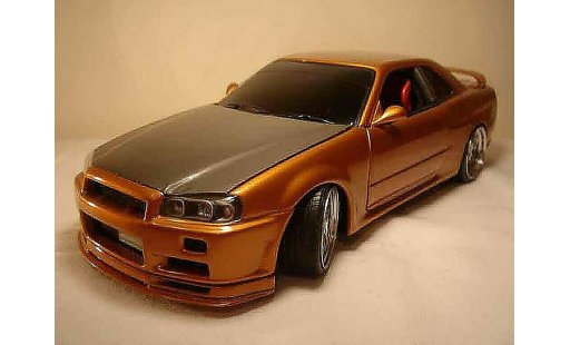 Nissan Skyline R34 1/18 Autoart oranje carbon kit nos modelauto