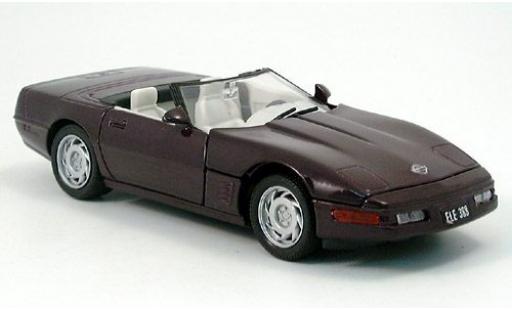 Modelauto Chevrolet Corvette Coupe dk. lila 1995 1/24 Welly