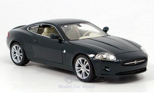 Modelauto Jaguar XK 150 Coupe metallic groen zonder Vitrine 1/24 Welly