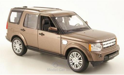 Modelauto Land Rover Discovery Base 4 metallic bruin 1/24 Welly