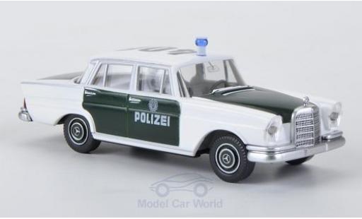 Modelauto Mercedes 220 Base S wit/groen Politie 1/87 Wiking